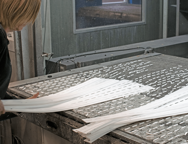 Insulation sheet cut from PTFE sheet using high pressure water jets (Waterjet cutting)